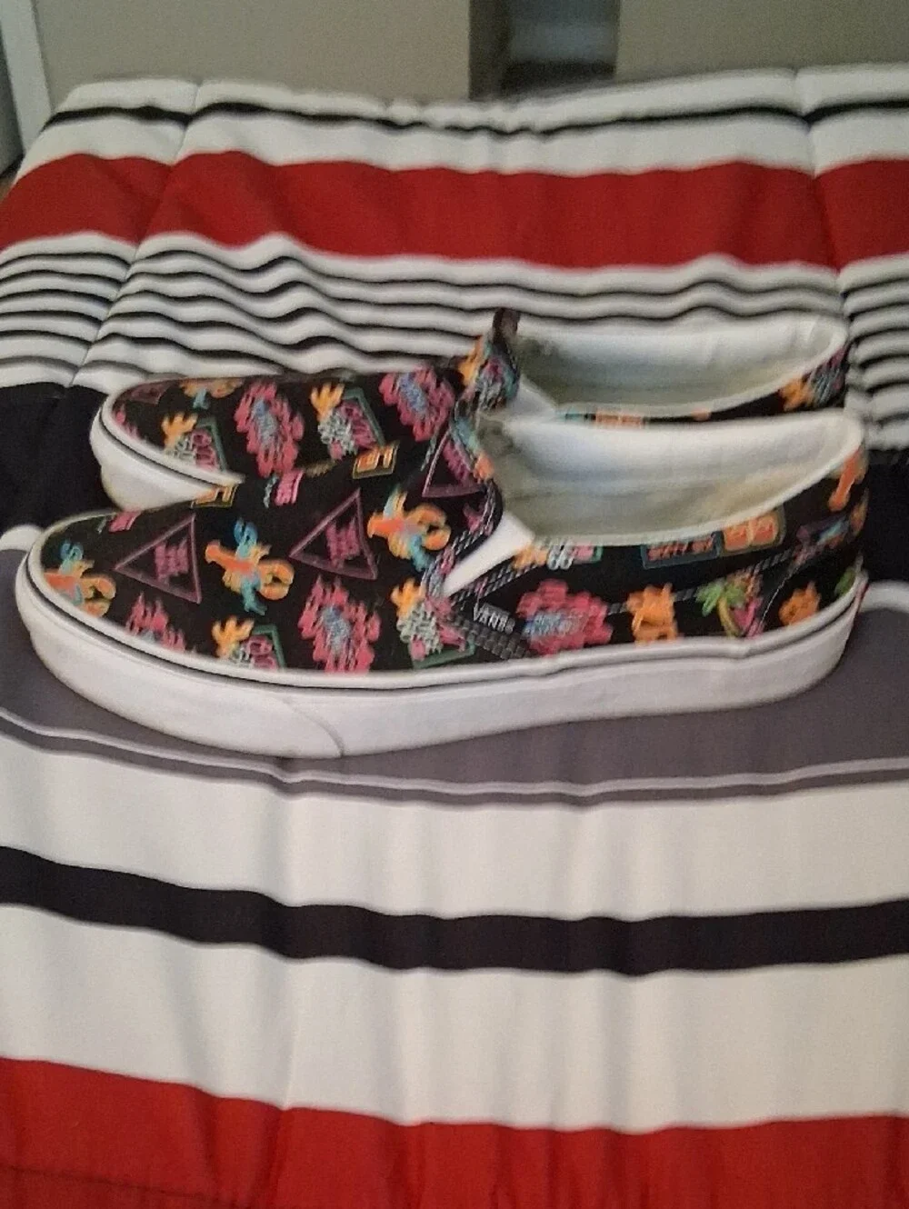 Vans Kids Black Slip-On Sneakers with Neon Tropical Print
